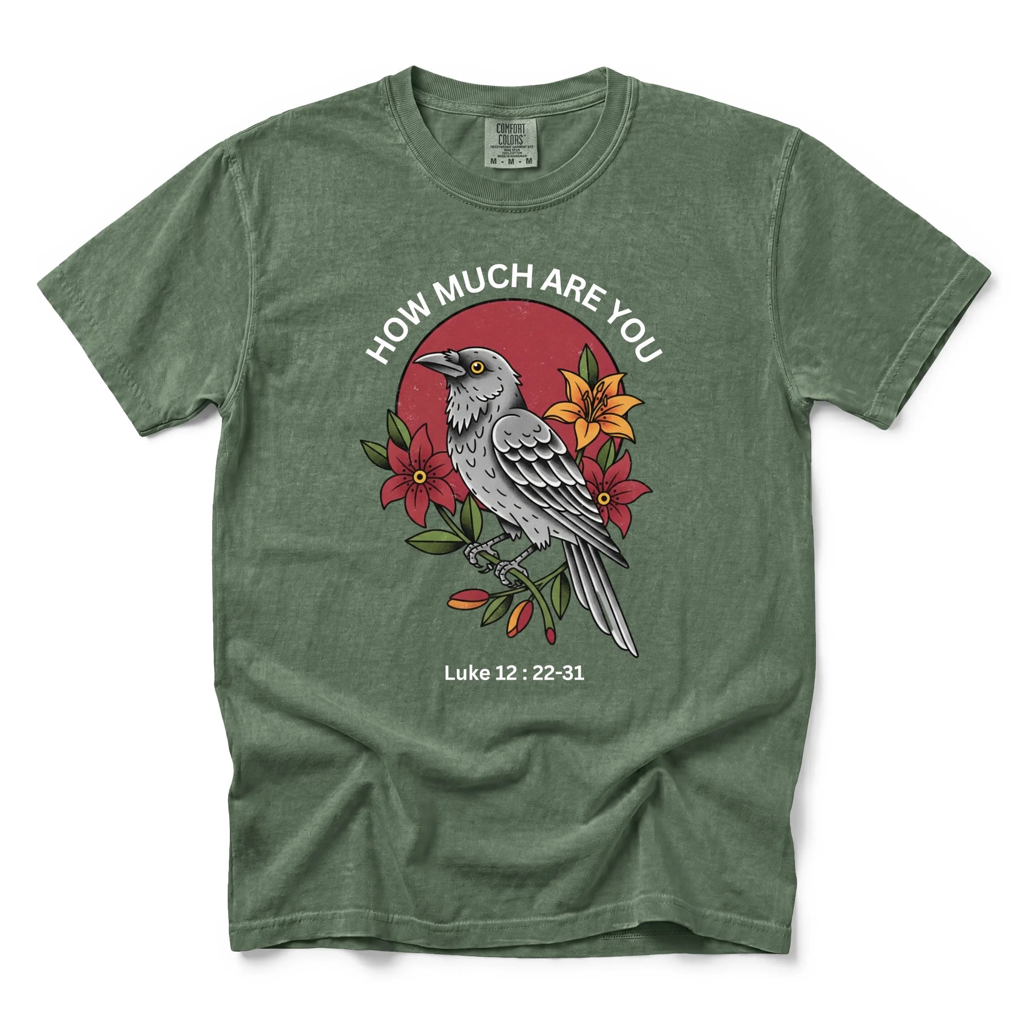 An moss short-sleeve t-shirt with a graphic print of a bird, flowers, and the text 'HOW MUCH ARE YOU Luke 12:22-31' on the front, displayed against a plain white background.